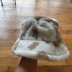 fluffy brown cow print bucket hat